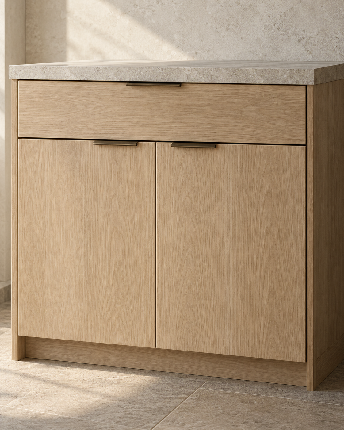 Illustrative pale oak slab cabinetry with closely spaced full-overlay doors